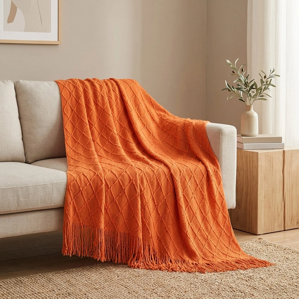 Knitted Blanket Sofa Cover Cover Blanket Office Air Conditioner — Orange-127 X180CM Including Tassels in a home setting; styling props not included. [fastbatch-140]