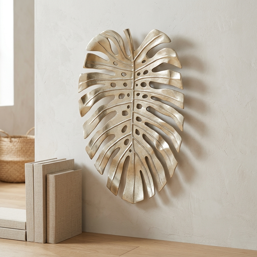 Gold Aluminum Monstera Leaf Wall Decor, shown in a home setting
